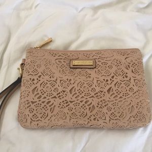 ALDO Blush pink laser cut clutch with handstrap